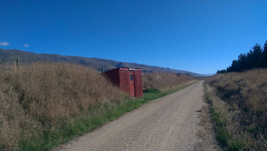 Trail under bright blue sky